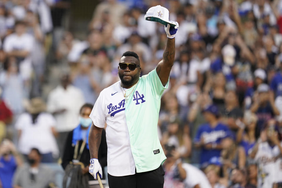 Former Boston Red Sox player David Ortiz tips his hat to the crowd during the MLB All Star Celebrity Softball game, Saturday, July 16, 2022, in Los Angeles. (AP Photo/Abbie Parr)