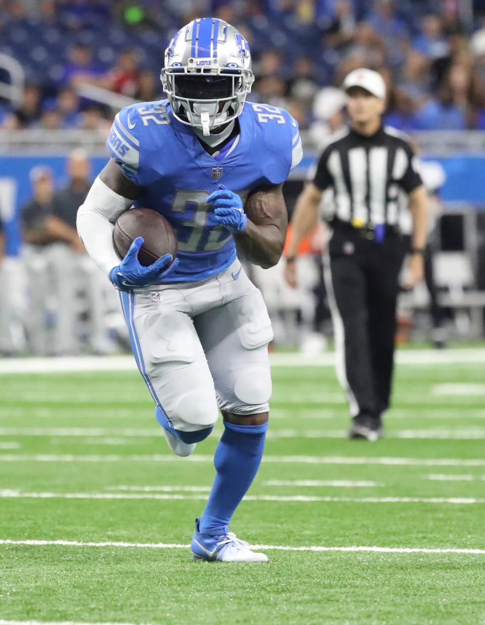 Lions running back D'Andre Swift runs for a touchdown during an August 12 preseason game against the Falcons. Swift ran for five touchdowns in 13 games last season.