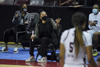 South Carolina coach Dawn Staley talks to a player during the first half of the team's NCAA college basketball game against North Carolina State on Thursday, Dec. 3, 2020, in Columbia, S.C. N.C. State won 54-46. (AP Photo/Sean Rayford)