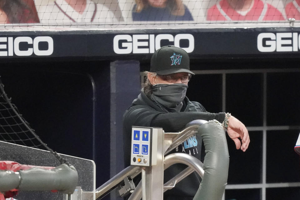 Miami Marlins manager Don Mattingly looks out onto the field during the team's baseball game against the Atlanta Braves on Tuesday, Sept. 22, 2020, in Atlanta. Mattingly's players are quick to say their success is a reflection of their manager, who keep the season afloat with a patchwork roster until the outbreak subsided. He's considered a strong contender for National League manager of the year.(AP Photo/Brynn Anderson)