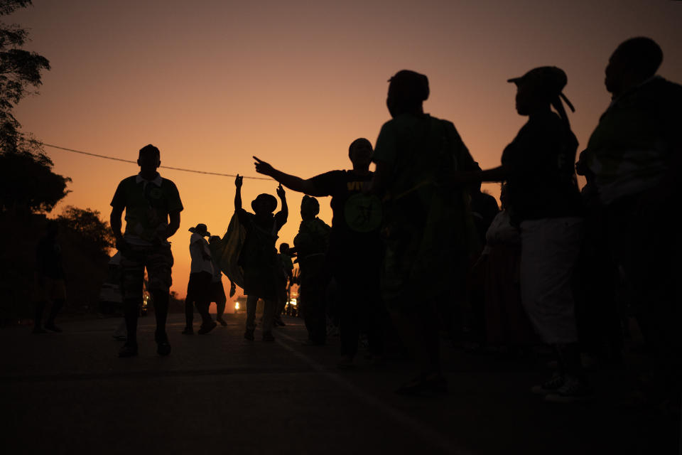 MK Party supporters dance in the middle of the street in Mahlbnathini village in rural KwaZulu-Natal, South Africa, on Thursday May 30, 2024. MK Party is currently leading in the provincial poll against the ANC, who've held the stronghold in the province for the last 20 years. (AP Photo/Emilio Morenatti)