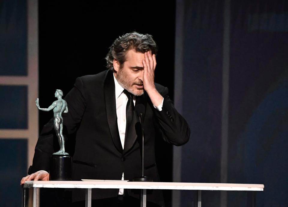 Joaquin Phoenix accepts the award for best lead actor for his role as Arthur Fleck in "Joker" during the 26th annual Screen Actors Guild Awards.