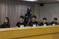 (L-R) Hong Kong Federation of Students' Council member Yvonne Leung, Council member Nathan Law, Secretary-general Alex Chow, Deputy Lester Shum, General Secretary Eason Chung attend a meeting with Senior Hong Kong government officials in Hong Kong October 21,2014. REUTERS/Tyrone Siu