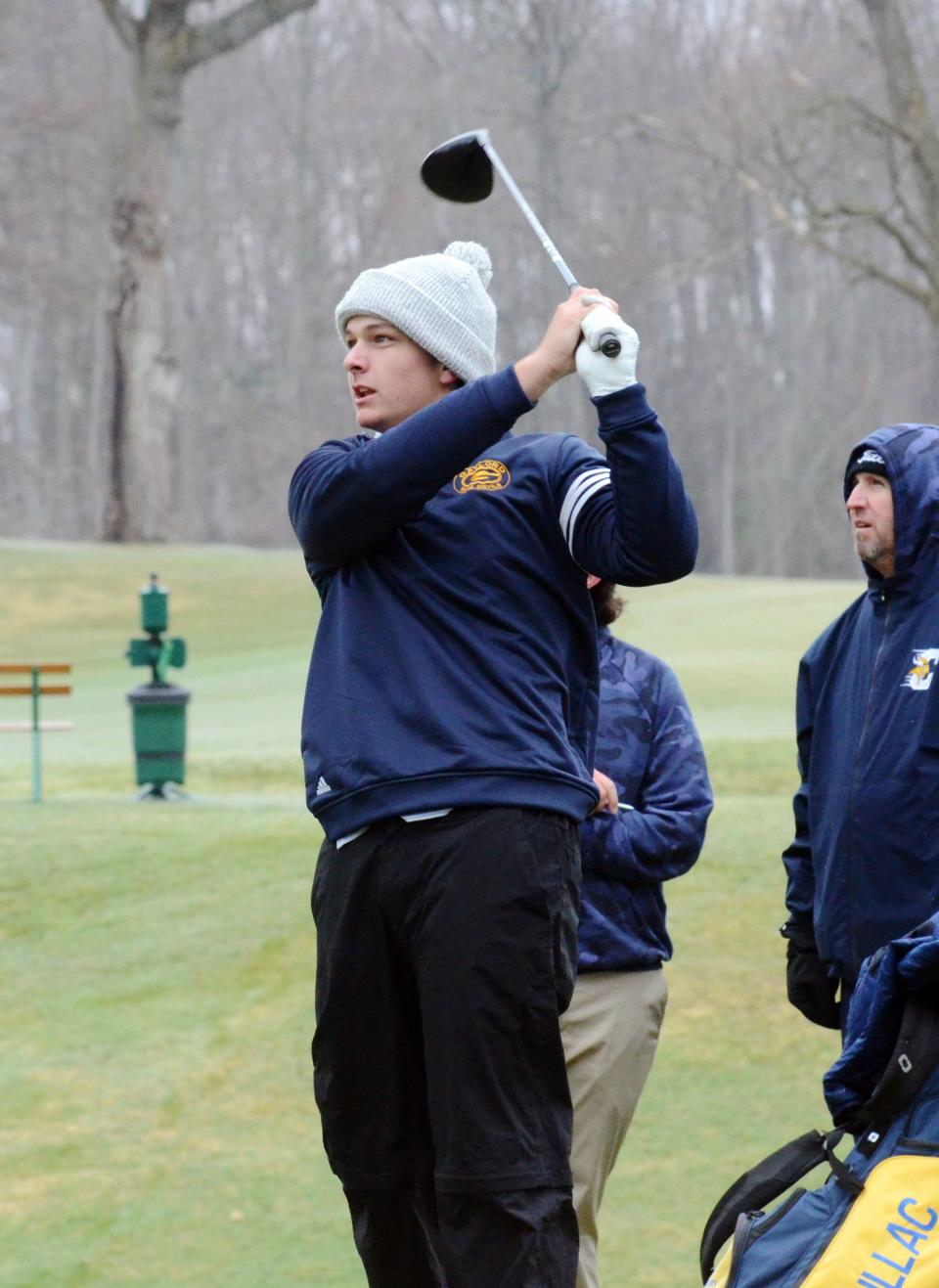 Gaylord's Kole Putnam keeps an eye on his tee shot on hole No. 3 of the Petoskey-Bay View Country Club Monday.