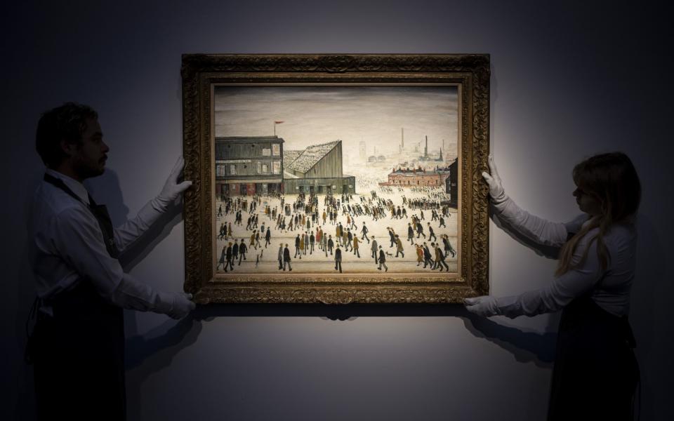 'Going to the Match' was painted in 1953 and depicts a crowd of Lowry’s typical stick-like figures walking towards Burnden Park - TOLGA AKMEN/EPA-EFE/Shutterstock