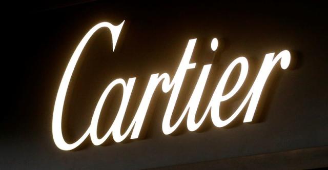 Tough time for luxury group Richemont as profit halved