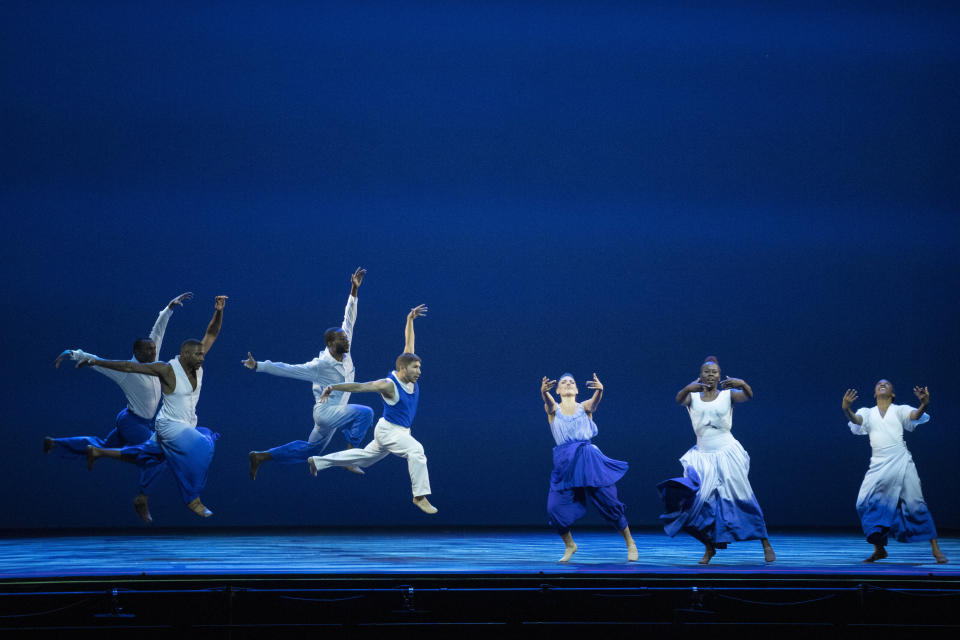 Dancers with Alvin Ailey American Dance Theater perform "Dancing Spirit" by Ronald K. Brown during the BAAND Together Dance Festival, Tuesday, July 25, 2023, at Lincoln Center in New York. (AP Photo/Mary Altaffer)