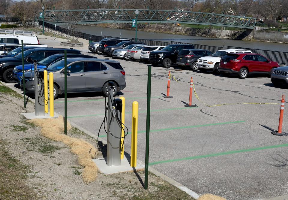 Electric vehicle charging stations installed at the east end of the Riverfront Parking Lot.