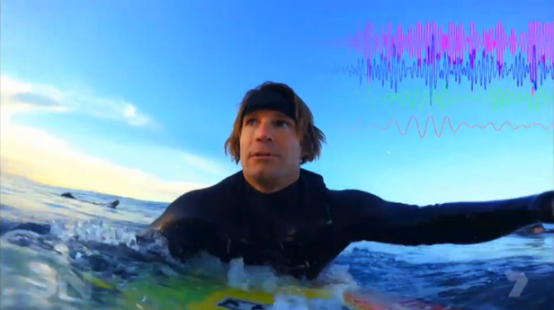 Denham with the 'brain station'  during a surf session