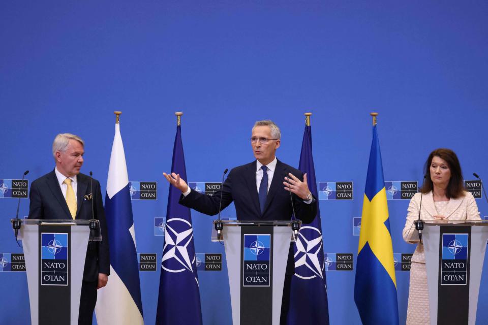 Finnish Foreign Minister Pekka Haavisto, from left, NATO Secretary General Jens Stoltenberg and Swedish Ministry for Foreign Affairs Anne Linde give a press conference after the signing of the accession protocols of Finland and Sweden at the NATO headquarters in Brussels on July 5, 2022.