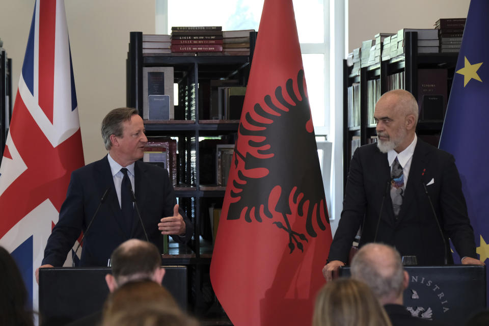 British Foreign Secretary David Cameron, left, and Albania's Prime Minister Edi Rama hold a news conference with in Tirana, Albania, Wednesday, May 22, 2024. Cameron hailed progress in a U.K.-Albania joint effort to cut illegal migration. (AP Photo/Vlasov Sulaj)
