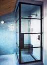 <p>Even if your bathroom only has space for a small shower, you can still make it feel and look luxe. Take, for example, this one designed by <a href="https://romanekdesignstudio.com/" rel="nofollow noopener" target="_blank" data-ylk="slk:Romanek Design Studio;elm:context_link;itc:0;sec:content-canvas" class="link ">Romanek Design Studio</a>. The baby blue zellige tiles and sleek matte black and glass enclosure makes a modern statement. A floating bench adds both formal and functional value, too. Also, if you're renovating or adding bathroom in an attic or somewhere with a sloped ceiling, make sure you place it strategically so it's at the highest point. </p>