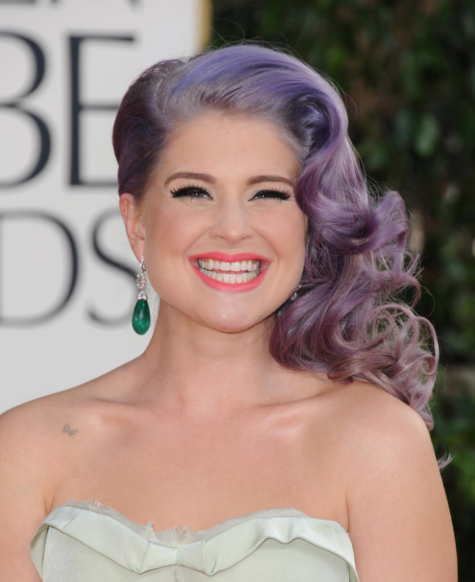 TV personality Kelly Osbourne arrives at the 70th Annual Golden Globe Awards at the Beverly Hilton Hotel on Sunday Jan. 13, 2013, in Beverly Hills, Calif. (Photo by Jordan Strauss/Invision/AP)