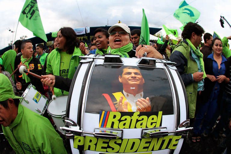 Supporters of Ecuadorean President Rafael Correa celebrate his re-election, in Quito on February 17, 2013