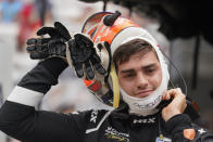 Rinus VeeKay, of the Netherlands, takes off his helmet during qualifications for the Indianapolis 500 auto race at Indianapolis Motor Speedway, Saturday, May 22, 2021, in Indianapolis. (AP Photo/Darron Cummings)