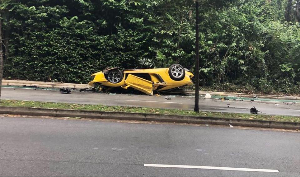 A Lamborghini overturned amid a three-car pile up in Sentosa Cove on Tuesday, 28 May 2018. PHOTO: Yahoo News Singapore reader