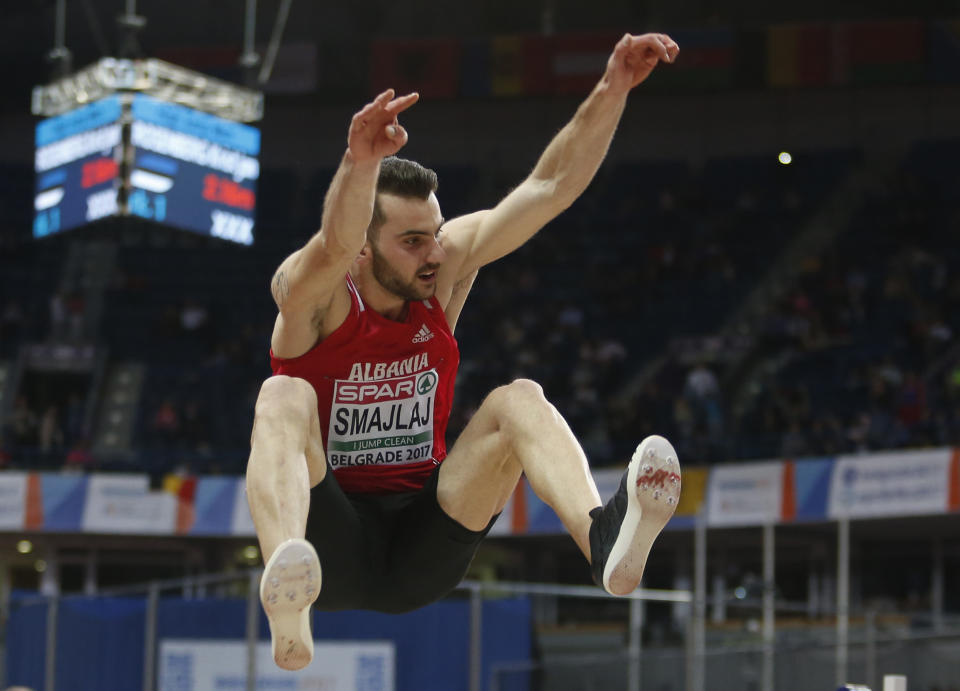 Albania's Izmir Smajlaj makes an attempt in the men's long jump final during the European Athletics Indoor Championships in Belgrade, Serbia, Saturday, March 4, 2017. (AP Photo/Marko Drobnjakovic)