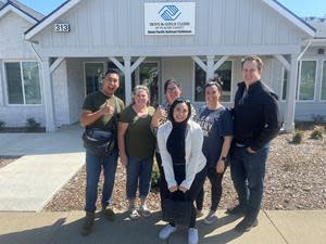 (L to R) Chester Videna, Jeannine Muser, Aspacia Cowan, Danielle Derego (front), Angie Vinyard, and Patrick Ryan from Associa Northern California recently volunteered to help the Boys & Girls Club of Placer County.