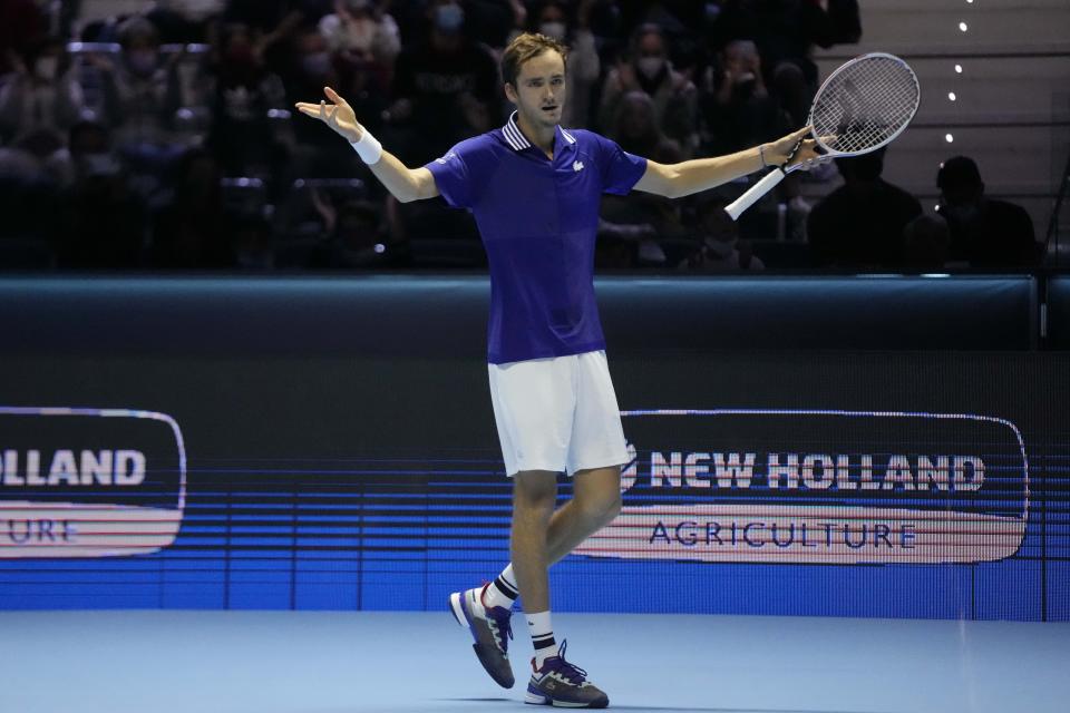 Danil Medvedev of Russia celebrates after winning a point as he plays Hubert Hurkacz of Poland during their ATP World Tour Finals singles tennis match, at the Pala Alpitour in Turin, Sunday, Nov. 14, 2021. (AP Photo/Luca Bruno)