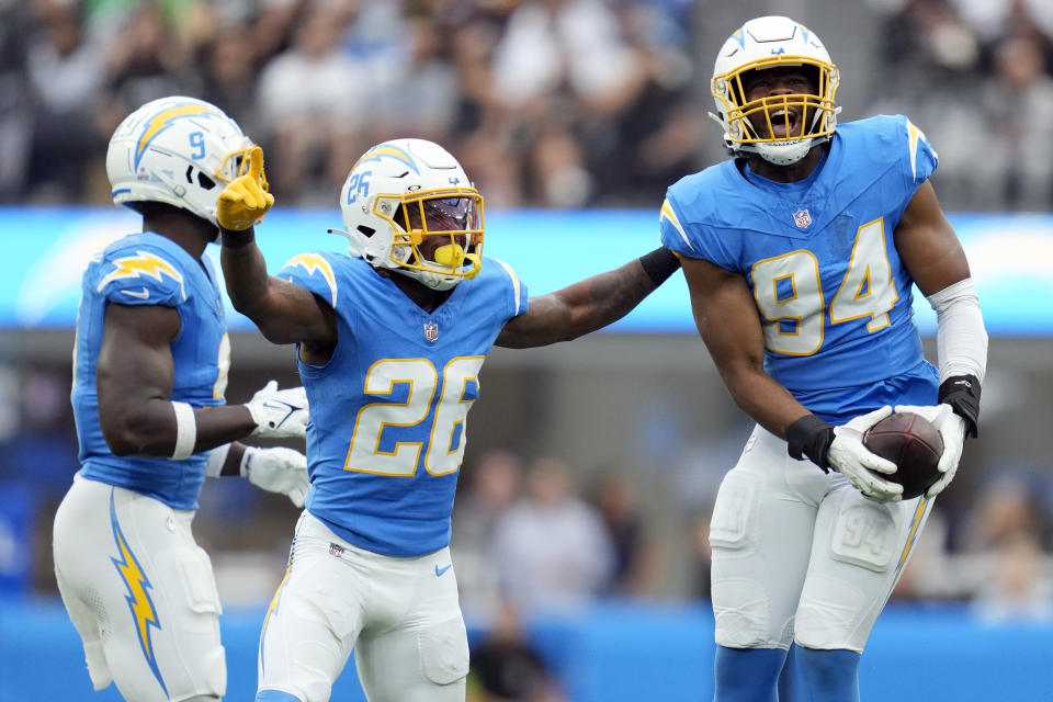 Los Angeles Chargers linebacker Chris Rumph II (94) reacts after recovering a fumble against the Las Vegas Raiders during the first half of an NFL football game Sunday, Oct. 1, 2023, in Inglewood, Calif. (AP Photo/Ashley Landis)