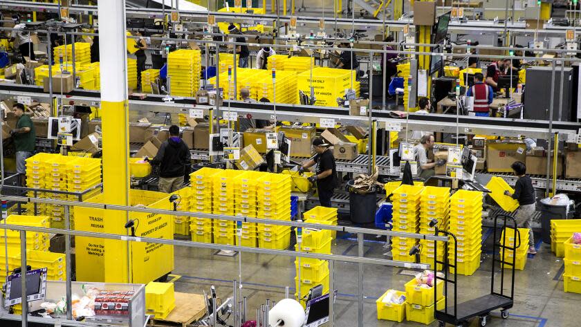 SAN BERNARDINO, CA - NOVEMBER 28, 2016: The Amazon Fulfillment Center is a bustle of activity on Cyber Monday on November 28, 2016 in San Bernardino, California.(Gina Ferazzi / Los Angeles Times)