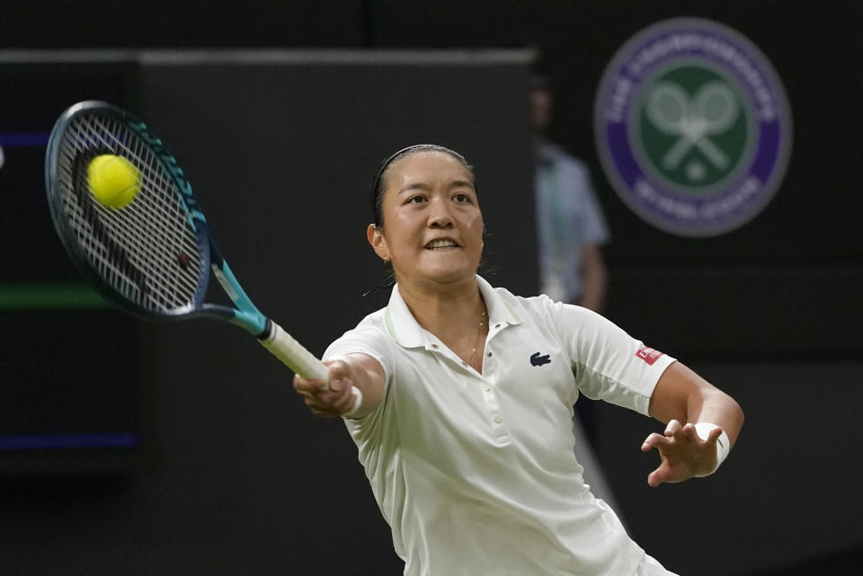 France's Harmony Tan returns to Serena Williams of the US in a first round women's singles match on day two of the Wimbledon tennis championships in London, Tuesday, June 28, 2022. (AP Photo/Alberto Pezzali)