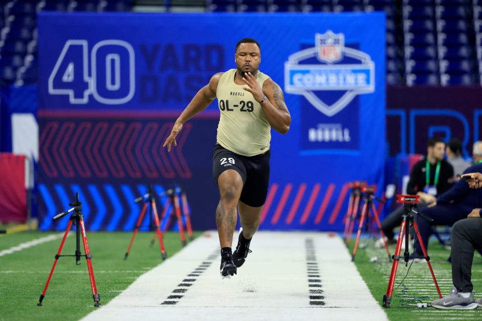 Tylan Grable of Central Florida participates in the 40-yard dash during the NFL Combine at Lucas Oil Stadium on March 03, 2024 in Indianapolis, Indiana.