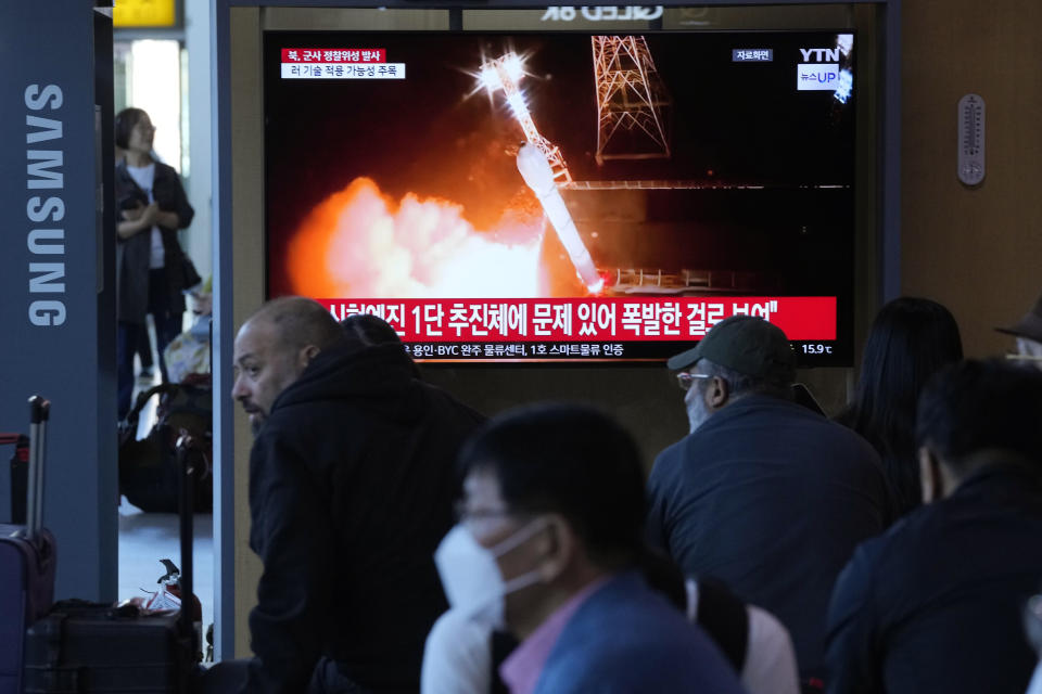 A news program broadcasts a file image of a rocket launch by North Korea, at the Seoul Railway Station in Seoul, South Korea, Tuesday, May 28, 2024. A rocket launched by North Korea to deploy the country's second spy satellite exploded shortly after liftoff Monday, state media reported, in a setback for leader Kim Jong Un's hopes to field satellites to monitor the U.S. and South Korea. (AP Photo/Ahn Young-joon)