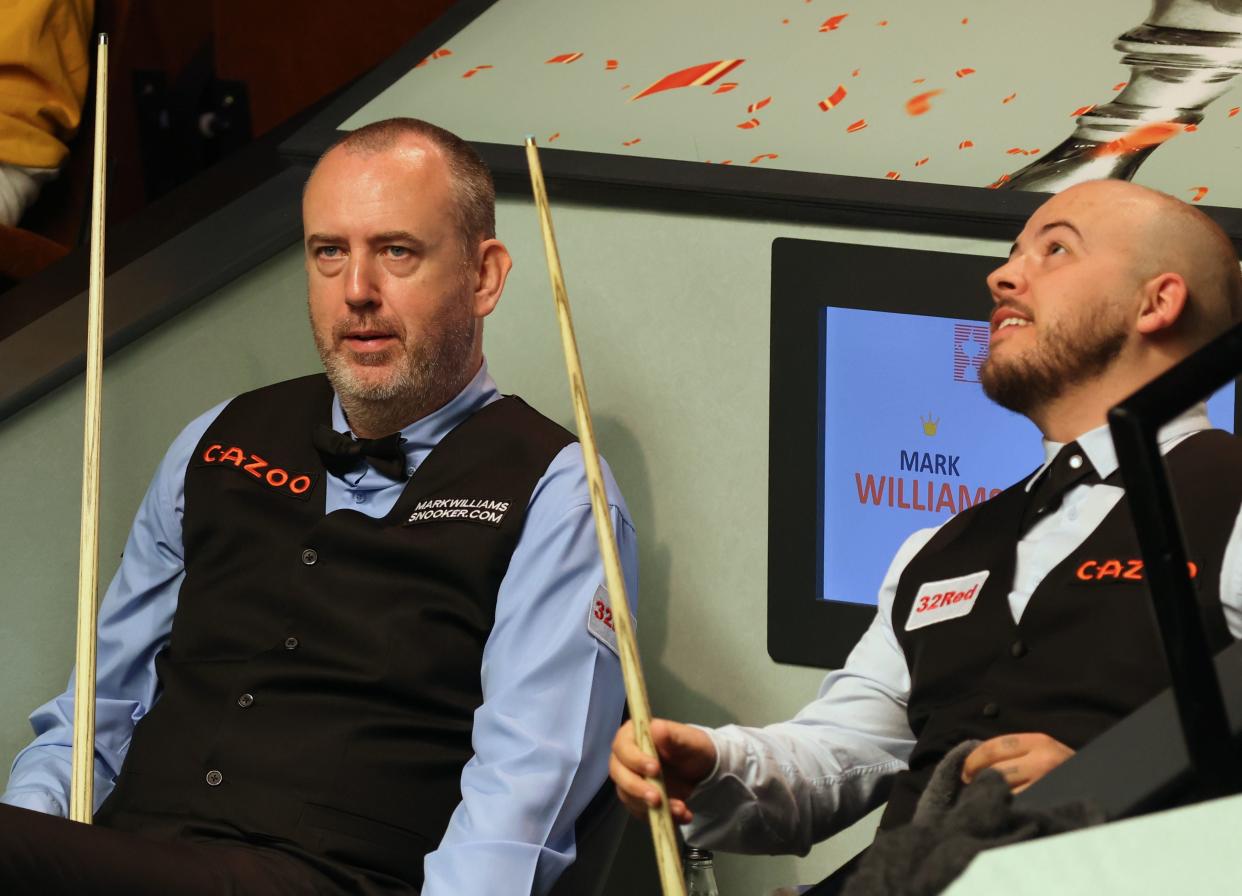 Luca Brecel, right, is leading against three-time champion Mark Williams (PA)
