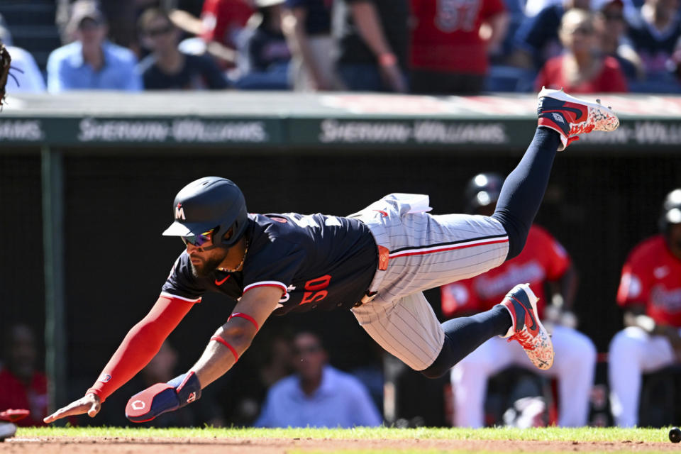 Minnesota Twins’ Willi Castro scores on a two-run double hit by Manuel Margot during the fifth inning of a baseball game against the Cleveland Guardians, Thursday, Sept. 19, 2024, in Cleveland. (AP Photo/Nick Cammett)