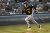 Pittsburgh Pirates' Jared Triolo runs home to score against the Oakland Athletics during the fourth inning of a baseball game in Oakland, Calif., Tuesday, April 30, 2024. (AP Photo/Jeff Chiu)