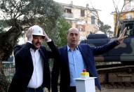 FILE PHOTO: Italy's interior minister Matteo Salvini and President of Lazio Region Nicola Zingaretti take part in the demolition of a villa built illegally by an alleged Mafia family in Rome