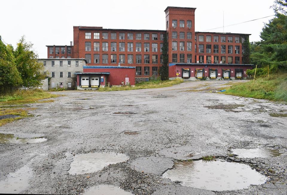 The former Wyoming Mills at 110 Chace St. are being redeveloped into housing, as seen on Sept. 25, 2023.