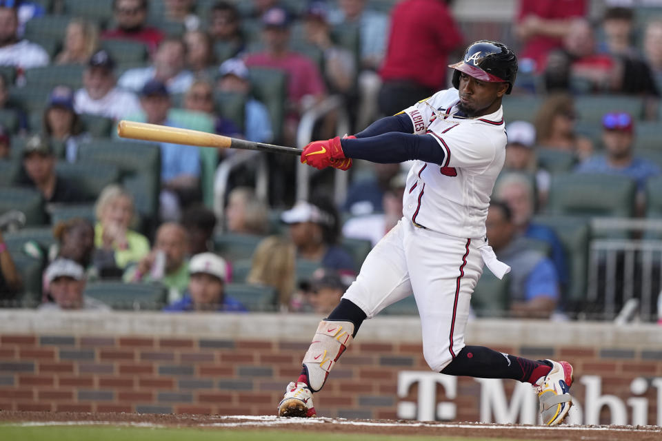 Atlanta Braves second baseman Ozzie Albies drives in two runs in the first inning of a baseball game against the Sunday, May 28, 2023, in Atlanta. (AP Photo/Brynn Anderson)