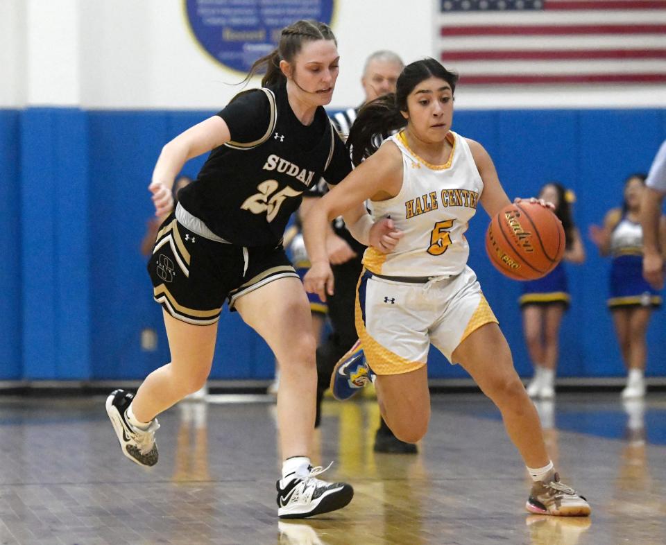 Hale Center's Mariyah Espinosa, right, dribbles the ball while Sudan's Gracyn Shultz guards during the District 4-2A girls basketball game, Friday, Jan. 6, 2023, at Hale Center High School in Hale Center.