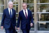 Mark Johnson, a British citizen who at the time of his arrest was HSBC's global head of foreign exchange cash trading, exits with his lawyer, Frank Wohl (L) following a hearing at the U.S. Federal Court in Brooklyn, New York, U.S., August 29, 2016. REUTERS/Brendan McDermid