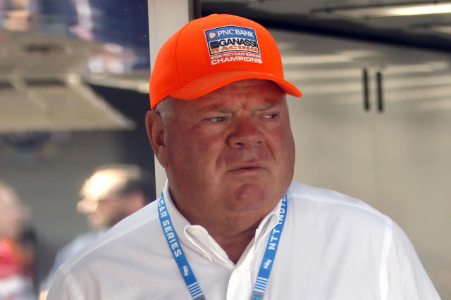 FILE - Car owner Chip Ganassi is seen in the paddock before an IndyCar race at Mid-Ohio Sports Car Course in Lexington, Ohio, Sunday, July 4, 2021. The conversation might not have even lasted 10 seconds. It was more of an exchange, really, but whatever Chip Ganassi said to Alex Palou after Sunday's, Aug. 7, 2022, race in Nashville was their first direct conversation since the reigning IndyCar champion said he was leaving the team. There's three races left in the season, Palou is in the thick of the title hunt and Ganassi is suing him. (AP Photo/Tom E. Puskar, File)