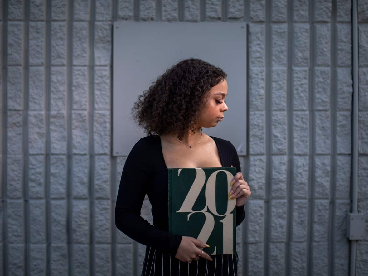 Janaye Majer says she was bullied and targeted with racial slurs during her time at Surrey's Queen Elizabeth Secondary. (Ben Nelms/CBC - image credit)