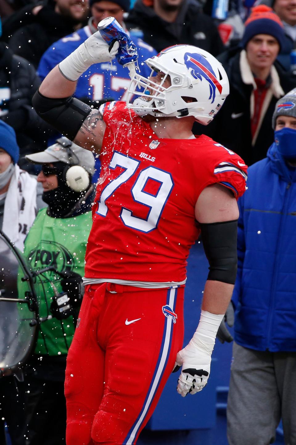 Buffalo Bills offensive tackle Spencer Brown (79) celebrates after a touchdown during the first half of an NFL football game against the Carolina Panthers in Orchard park, N.Y., Sunday Dec. 19, 2021. (AP/ Photo Jeffrey T. Barnes)