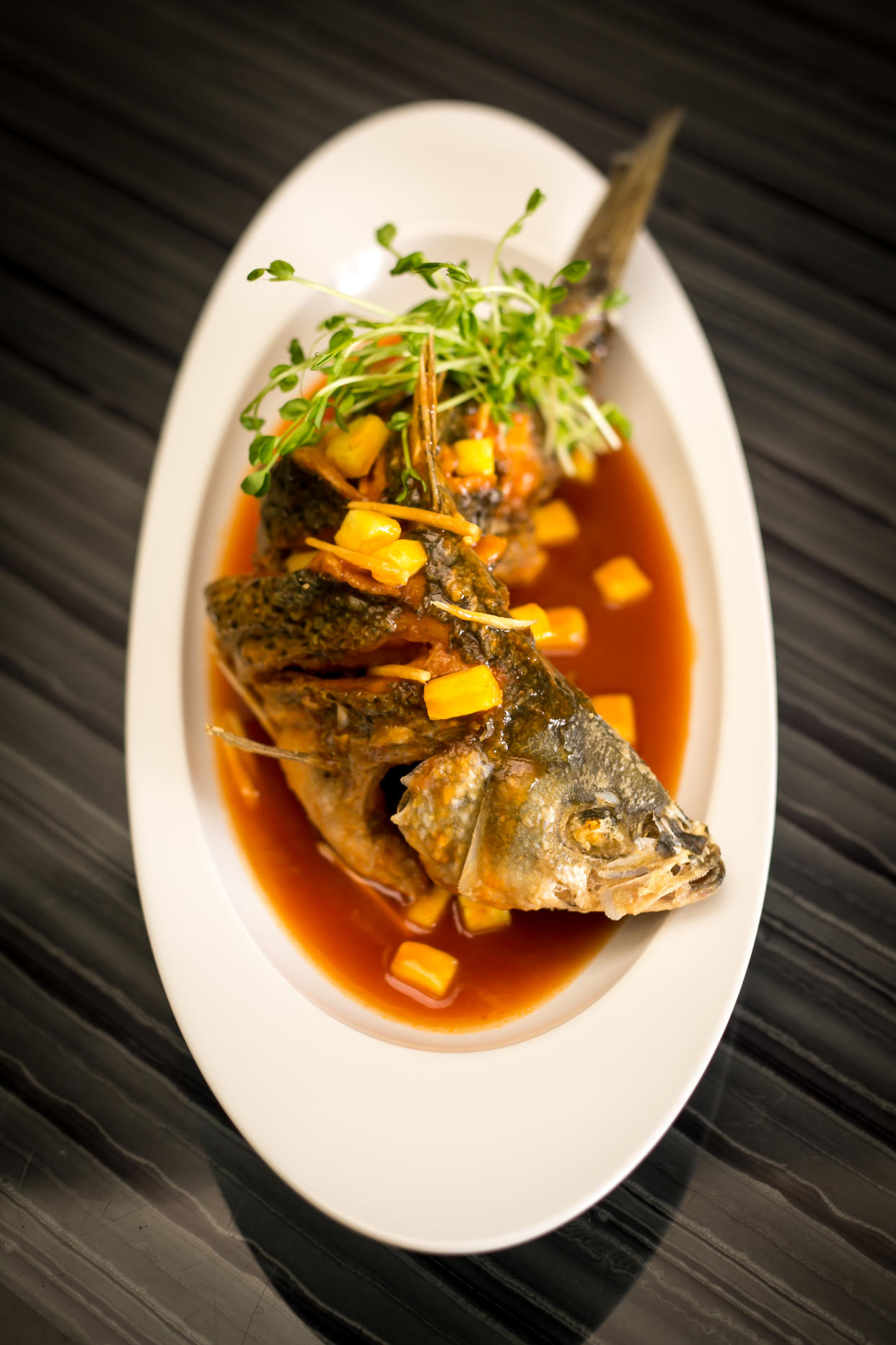 The crispy whole fish served at Umi Sushi and Oyster Bar. (Photo: Umi Sushi and Oyster Bar)