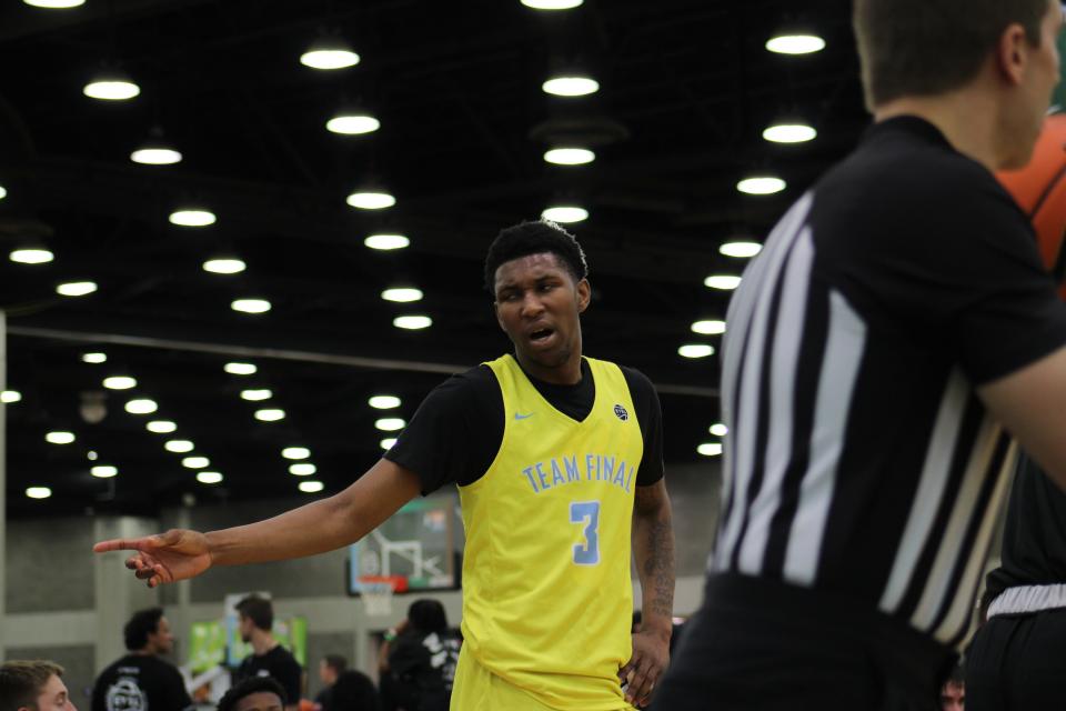 Justin Edwards of Team Final talks to a teammate on the bench during an AAU basketball game on Saturday, May 28, 2022, at the Kentucky Exposition Center in Louisville, Ky. Edwards is one of the top prospects in the 2023 class and has a scholarship offer from Kentucky.