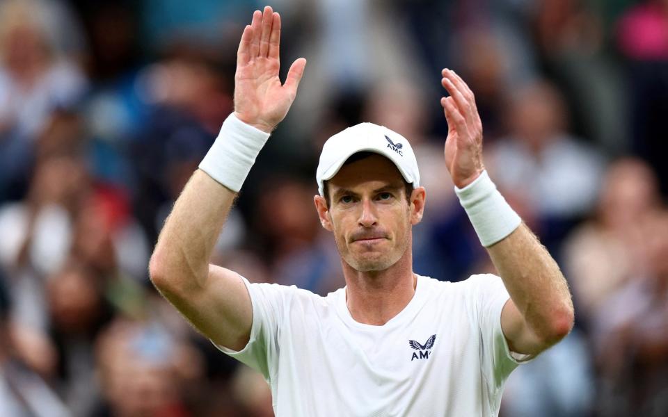 Andy Murray celebrates after winning his first round match against Britain&#39;s Ryan Peniston