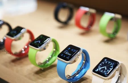Apple watches are displayed following an Apple event in San Francisco, California in this March 9, 2015 file photo. REUTERS/Robert Galbraith/Files