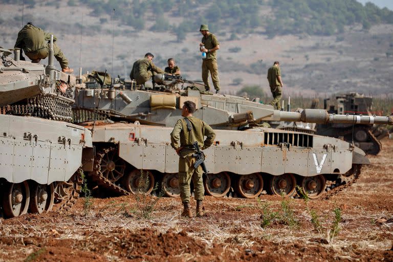 Soldados israelíes en una posición cerca de la frontera con el Líbano. (Jalaa MAREY / AFP)
