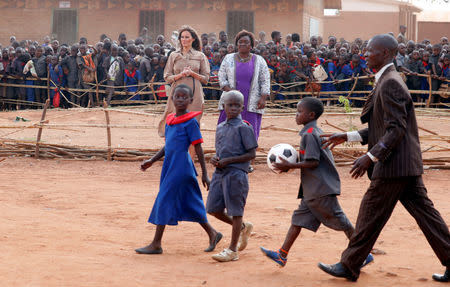 U.S. first lady Melania Trump looks on as she visits a school in Lilongwe, Malawi, October 4, 2018. REUTERS/Carlo Allegri