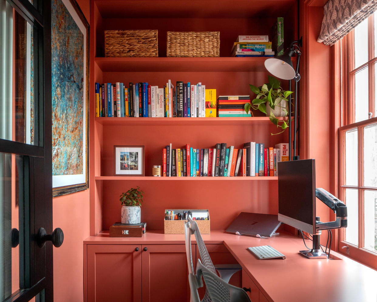  A color drenched red home office. 