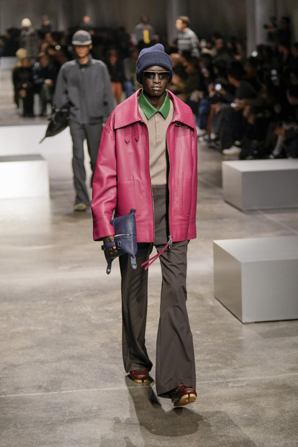 A model wears a creation as part of the men's Fendi Fall-Winter 2024-2025 collection, that was presented in Milan, Italy, Saturday, Jan. 13, 2024. (AP Photo/Antonio Calanni).