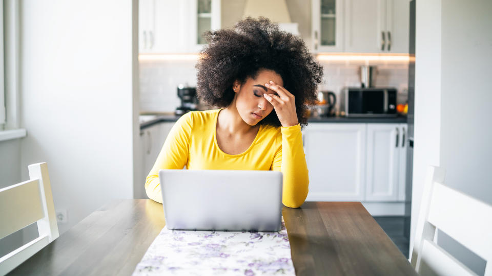 Depressed woman at home.