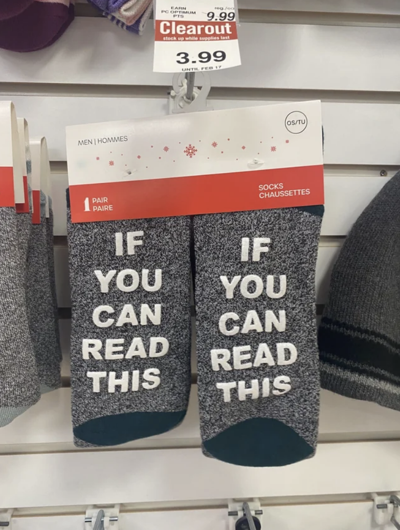 Two pairs of socks that read: "If you can read this"