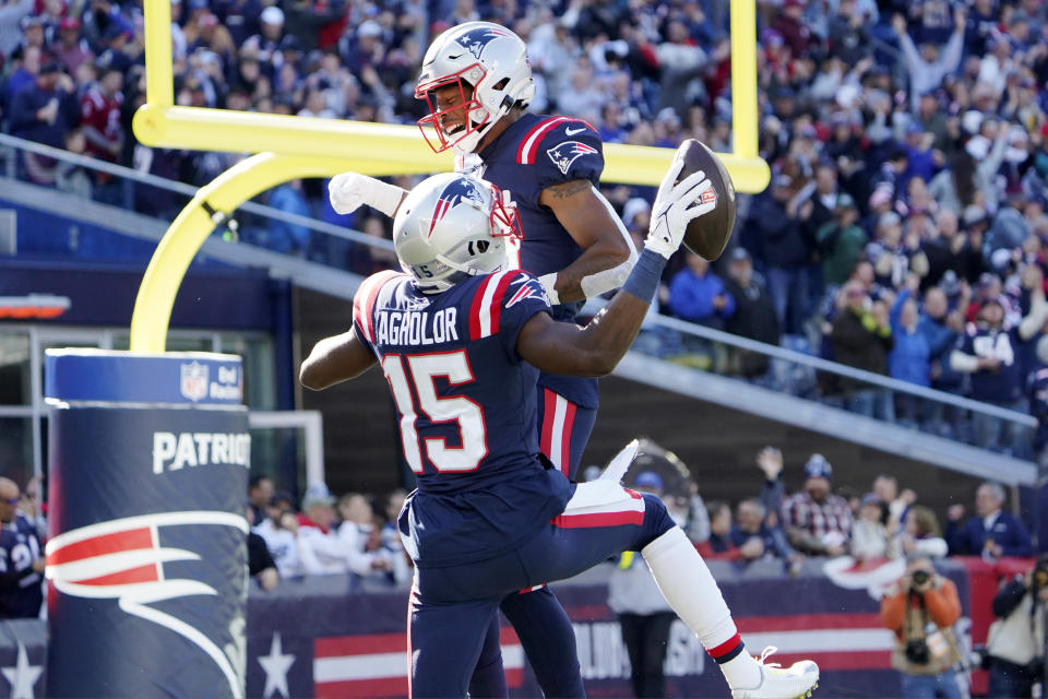 New England Patriots wide receiver Nelson Agholor (15) Jakobi Meyers, rear, after his touchdown during the first half of an NFL football game against the New York Jets, Sunday, Oct. 24, 2021, in Foxborough, Mass. (AP Photo/Mary Schwalm)